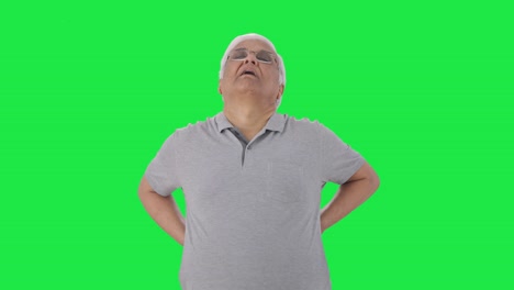 Sick-Indian-old-man-having-a-back-pain-Green-screen