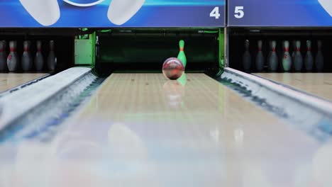 one lone pin falls after precise bowling throw lands direct hit in final shot