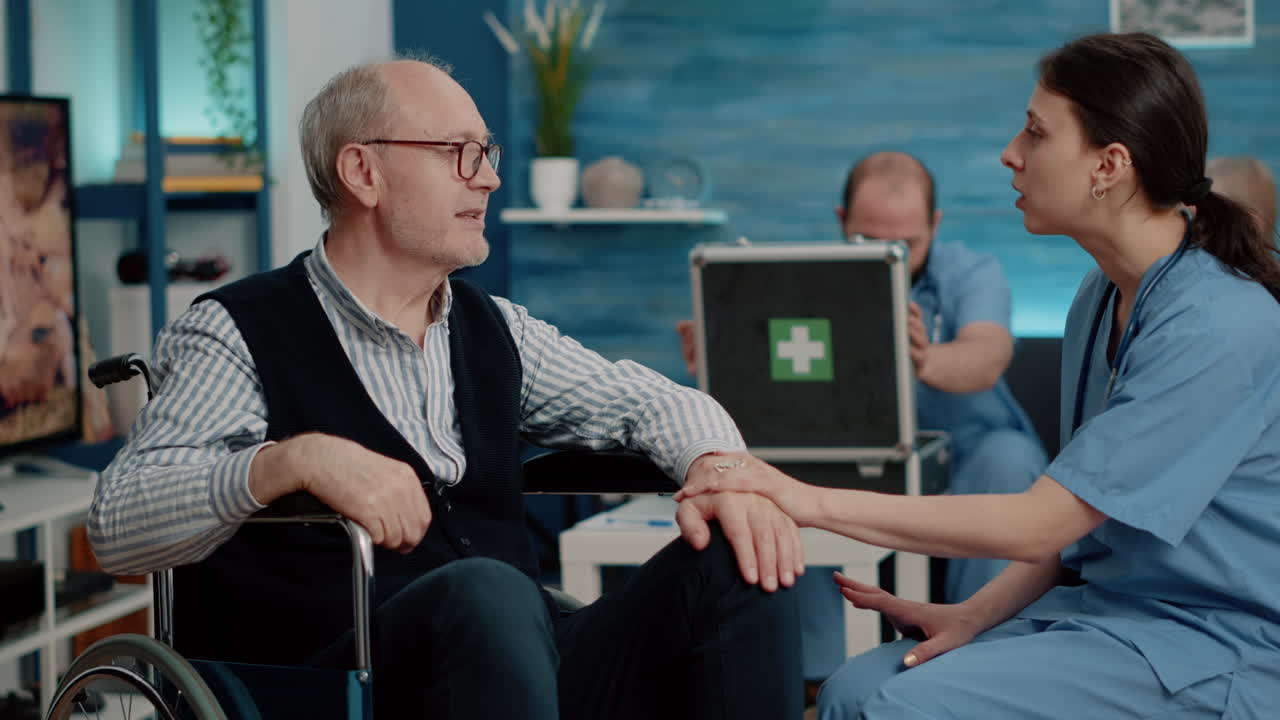 Patient with handicap getting assistance from nurse