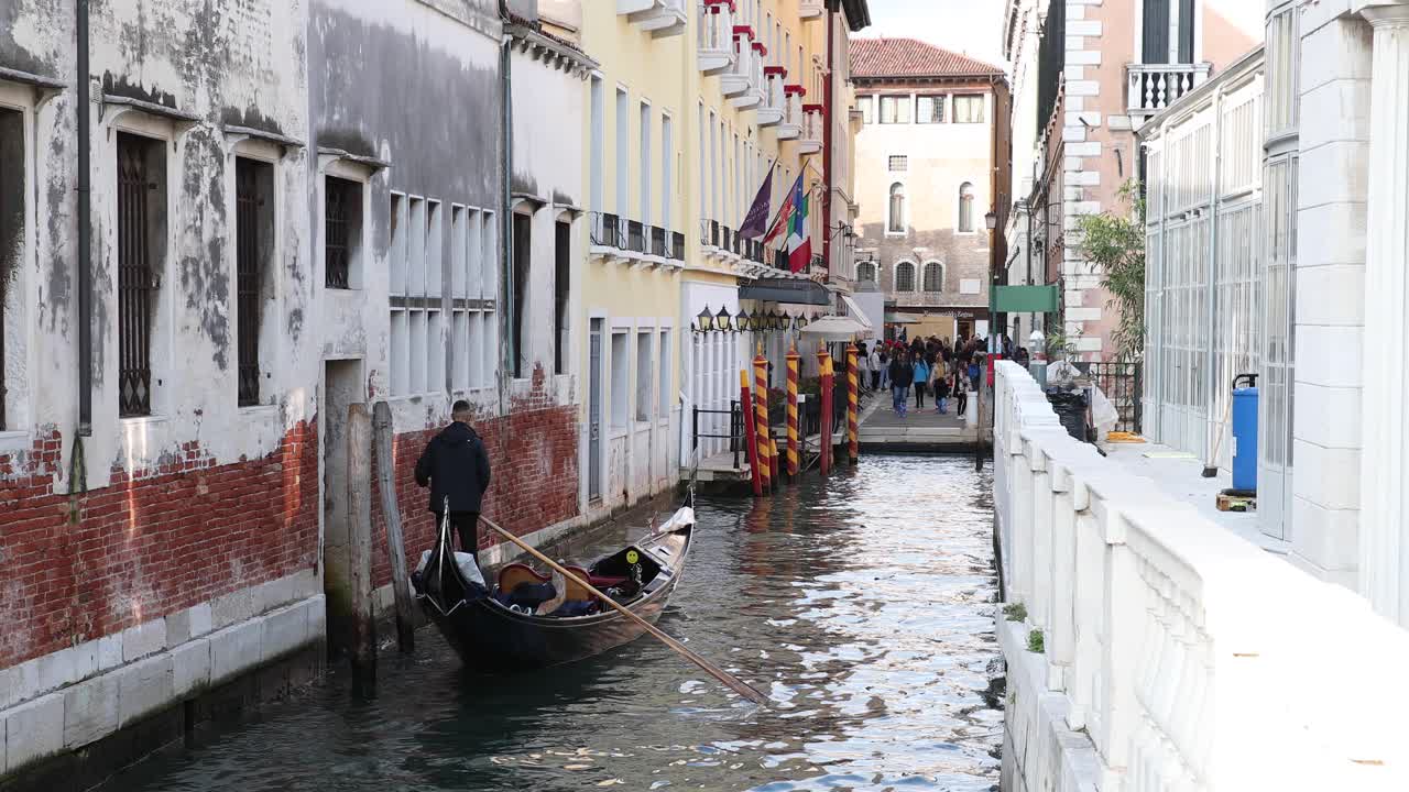 Gondola ride through the canals of Venice, Italy