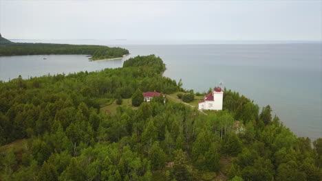 aerial descent to cabot head lighthouse on bruce peninsula, canada