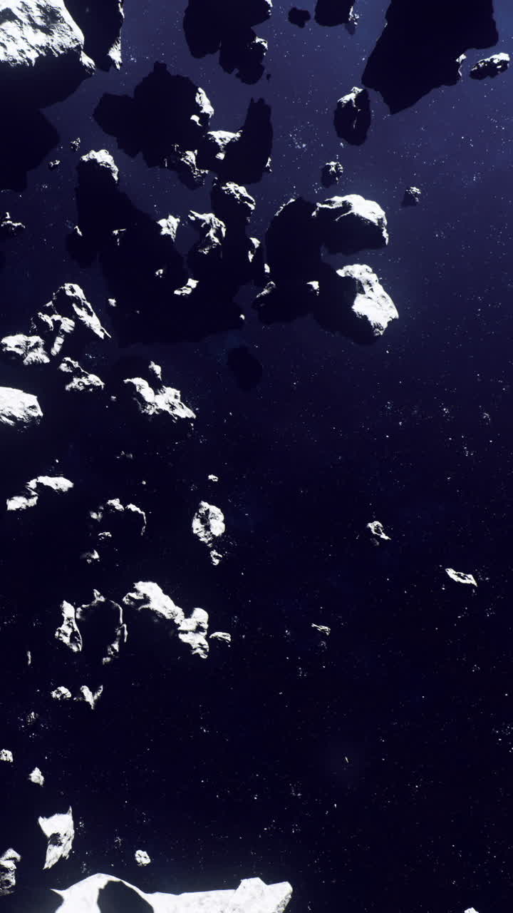 Outer space scene showing asteroids in a dark expanse