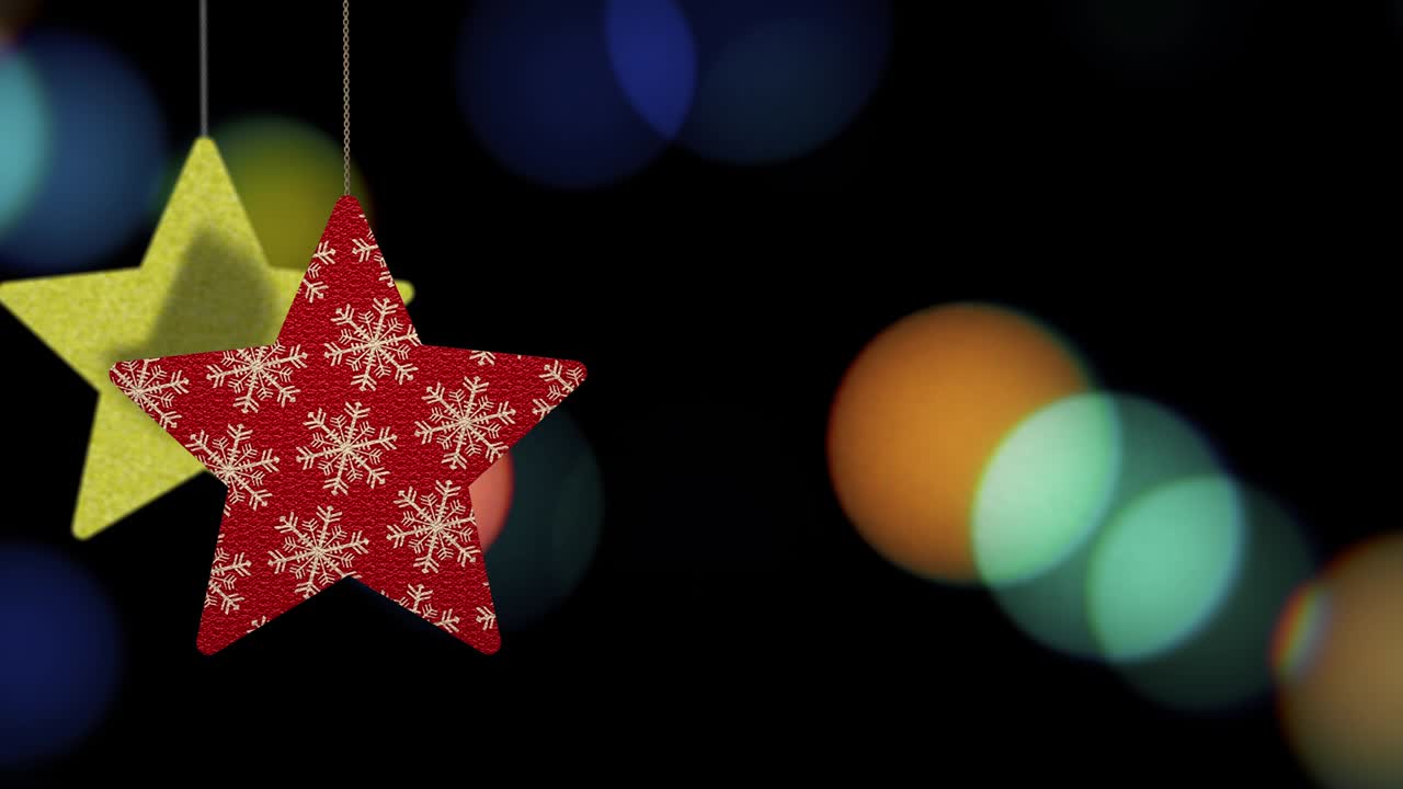 los adornos de las estrellas de navidad se mueven en el fondo de bokeh.