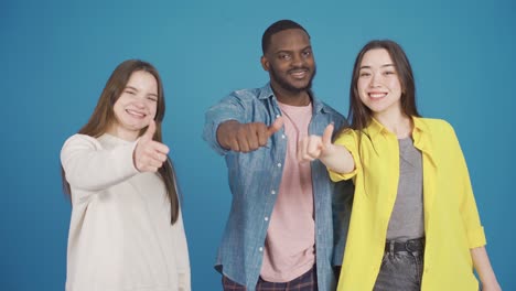 close-up portrait of group of friends of different races. smile and approve.