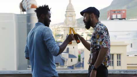 young adult friends hanging out on a rooftop