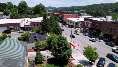 aerial push in over post office in boone nc, boone north carolina along king street