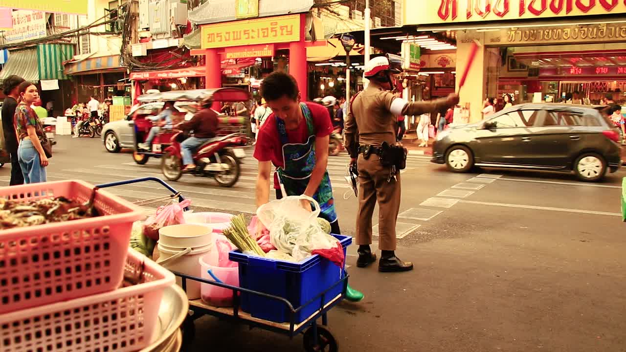 Editorial. Busy morning scene of the seafood market in Chinatown or Yaowarat Road in Bangkok, Thailand