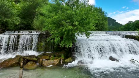 savinja river waterfall landscape in logar valley slovenia, natural unpolluted water flow below luce town, travel and tourism