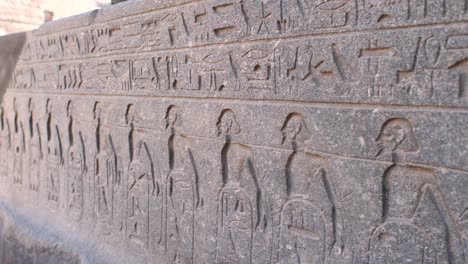 detail view of ancient writings in the luxor temple, egypt