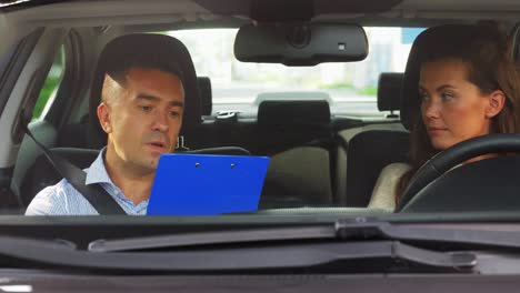 driving instructor and student during a driving lesson