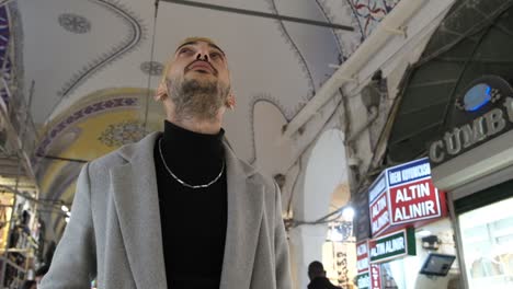 young man grand bazaar dome