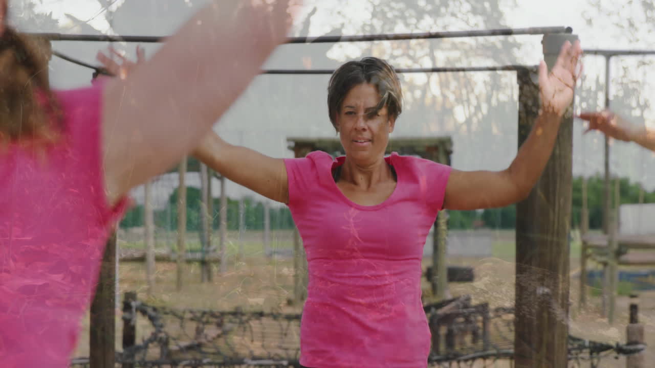 Woman in pink shirt exercising outdoors with abstract overlay animation