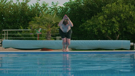 man jumping into swimming pool 1