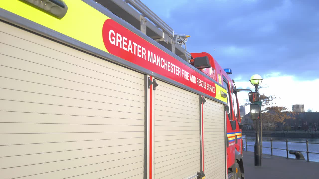Greater Manchester Fire and Rescue Service Engine overlooking water 2
