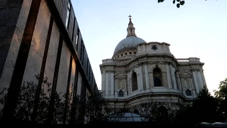 Low-angle-rear-view-shot-of-St-Paul's-Cathedral,-London-at-sunset