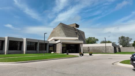 pushing in while tilting up to reveal the impressive stature of the concrete structure