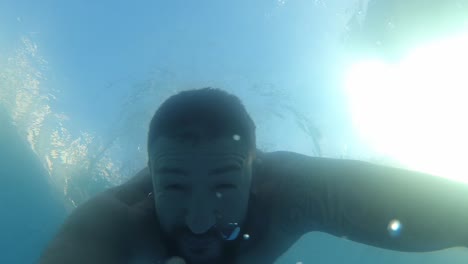 man bathing in the pool