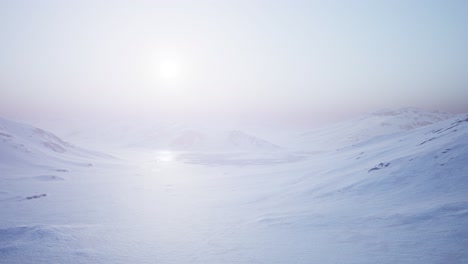 Aerial-Landscape-of-snowy-mountains-and-icy-shores-in-Antarctica