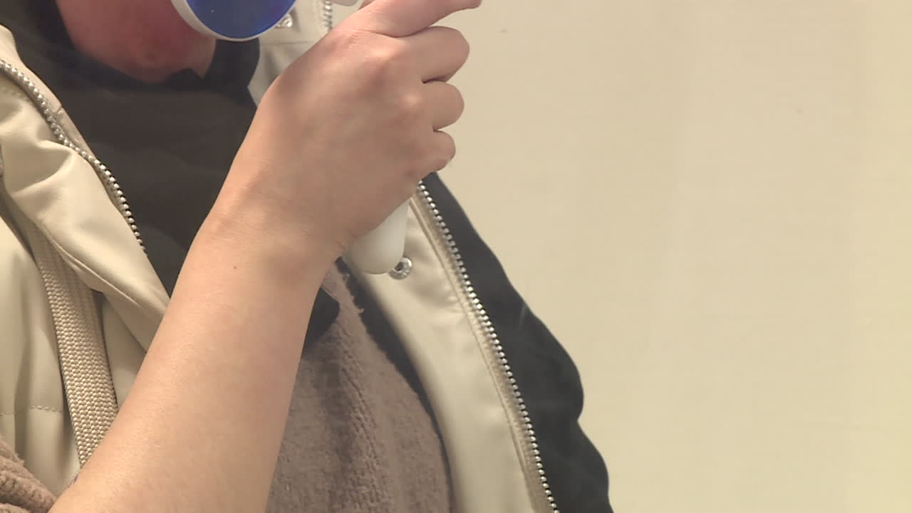 Woman undergoing a breathing test or examination