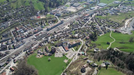 beautiful aerial flight over the village wattwil in a swiss rural valley