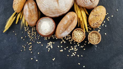 bread loaves with wheat and flour