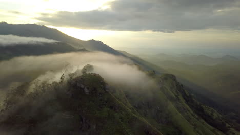 beautiful rotating aerial drone shot of adam's peak in ella, sri lanka