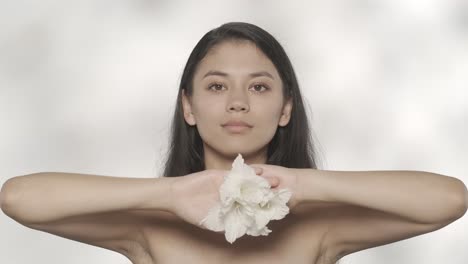 woman with white flower