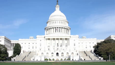 Workers-and-pedestrians-enter-exit-and-walk-by-the-United-States-Capitol-Building