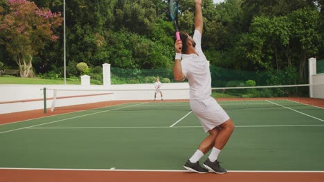 tennis player doing a service