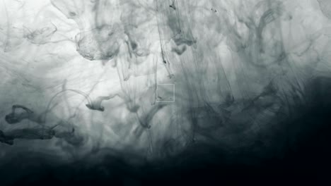 close up black colored drop in the water , the abstract motion movement of watercolor ink splashing background , 4k dci resolution
