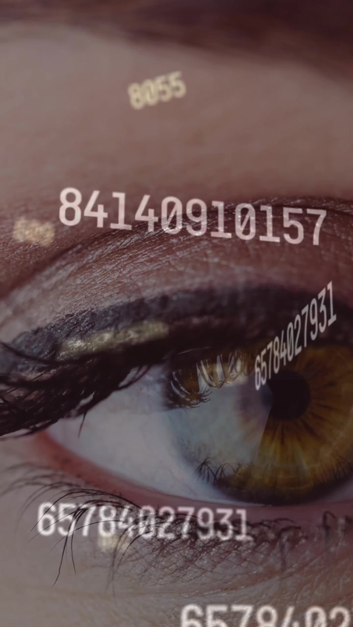 Animation of data processing over eye of caucasian woman