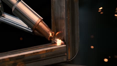 laser welding machine. shot on super slow motion camera 1000 fps. laser welding is shown in close-up