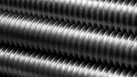 screw metal texture super macro. moving forward, factory conveyor