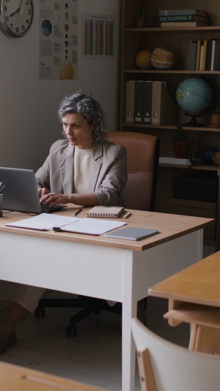 Teacher Working in a Classroom