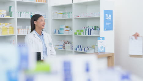 patient buying medicine from pharmacist