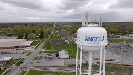 Angola,-Indiana-water-tower-with-drone-video-moving-left-to-right