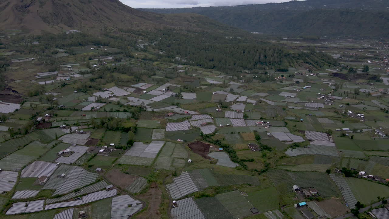 Panning aerial shot of Bali landscape and mountain