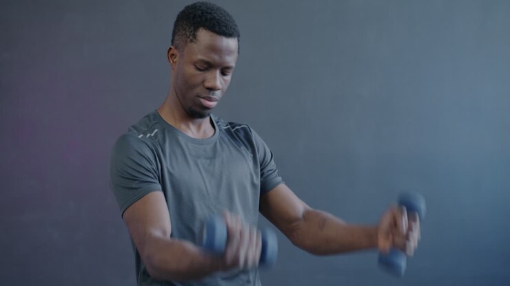 Man Lifting Dumbbells