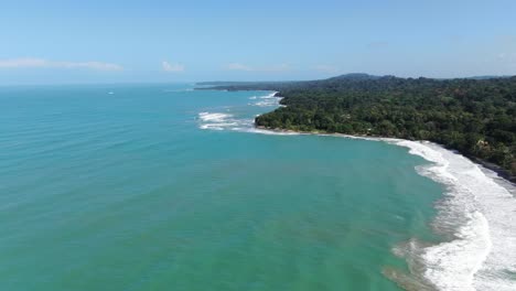 Costa-Rica-beach-drone-view-showing-sea,-shore-and-forest