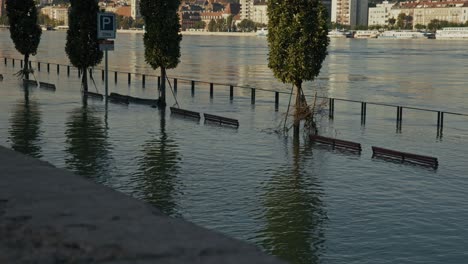benches and parking zone submerged during the budapest flood 2024 river overflow