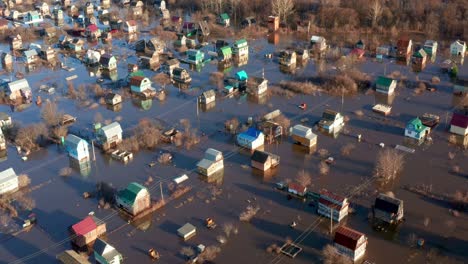 the peak of the spring flood in the village of bashkortostan. destroyed outbuildings and flooded cottages. natural disasters.