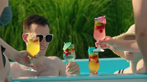 friends celebrating at the pool