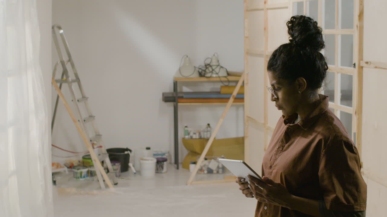 Woman using tablet in the studio