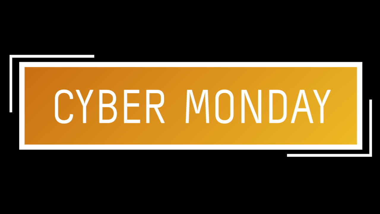 texto blanco y naranja de cyber monday que aparece contra una pantalla negra