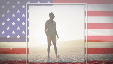 bandera estadounidense con efecto de falla contra hombre afroamericano caminando por la playa