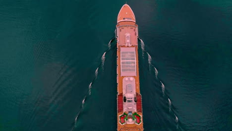 incredible drone footage of cruise ship navigating in blue sea waters