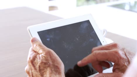 senior man using tablet