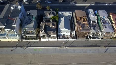 bicycle and pedestrian path on the beach amazing aerial view flight bird's eye view drone footage at la santa monica pier california usa 2018 cinematic view from above tourist guide by philipp marnitz