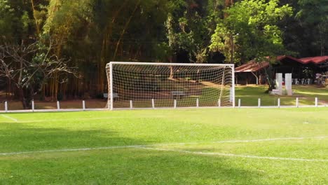 drone travelling at field level. amateur soccer brazil