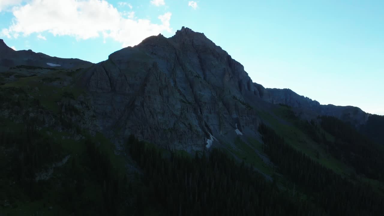 Mount Sneffels Rocky Mountains peak Wilderness Ridgway Telluride Colorado aerial drone summer sunset dusk golden hour shaded peaks Lower Blue Lake San Juan Uncompahgre National Forest upwards